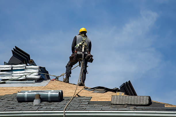 Professional Roof Replacement technician working in Hampton, NH